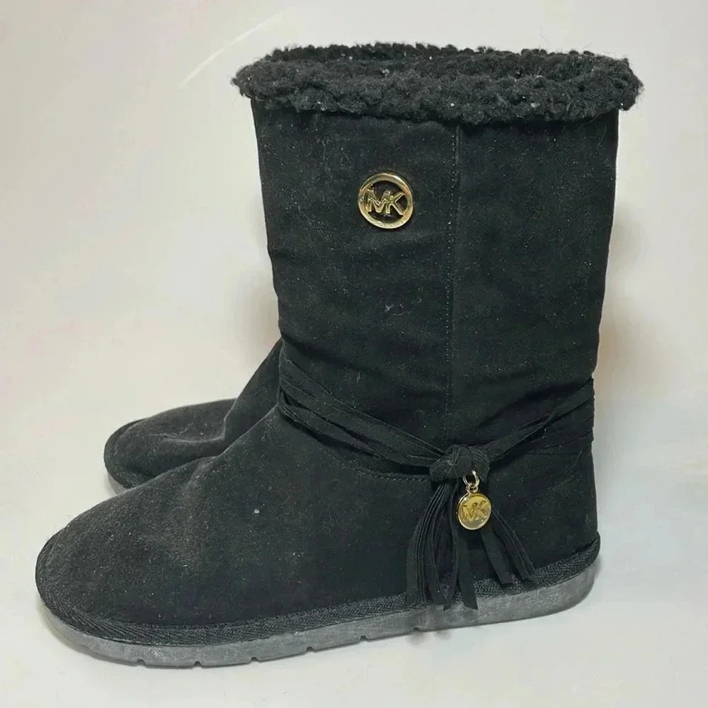 Michael Kors black fuzzy boots with gold accent and tassels size 5